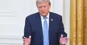 Trump Health Fears as President Tries to Hide Bruised Hands During Speech