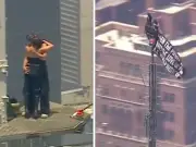 Two Climbers Scale Empire State Building with Peace Flag Before July 4th