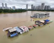 Typhoon Maysak Leaves 11 Dead, Snakes Loose in China; Mumbai Floods Kill 13