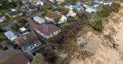 UK village residents forced to abandon homes as cliffs erode into sea