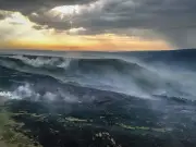 UK Wildfires Spread as Heat Health Warnings Issued for Seven Regions