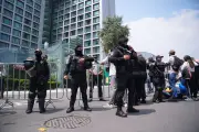 UK100 Riot Police Guard England Hotel After Hostile Reception in Mexico