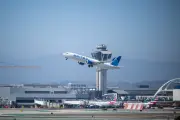 United Airlines probes worker's threat to call ICE in viral video
