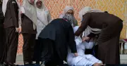 Unmarried Couple Publicly Caned 21 Times for Kissing in TikTok Livestream in Indonesia's Aceh