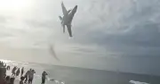 US Navy Jet Buzzes Pensacola Beach, Blows Umbrellas and Chairs in Low Flyby