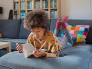 What age can children be left home alone during UK summer holidays?