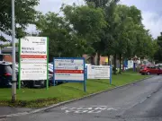 Woman avoids jail for racist abuse and assault on care workers