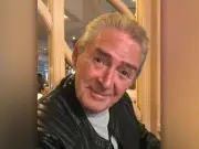 Woman charged with murder of beloved grandad Trevor Hilton in Bolton