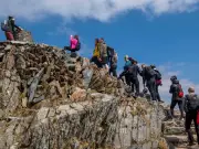 Woman Climbs Yr Wyddfa, Stunned by 90mph Winds at Summit