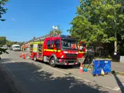 Woman dies in house fire near Coventry; second in hospital