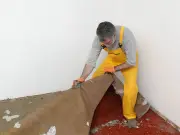 Woman Finds Original Hardwood Floors Under Old Carpet in New Home