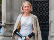 Woman loses two limbs in Tube accident, sues TfL