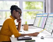 Women and university graduates in Australia most at risk of losing jobs to AI, government report finds