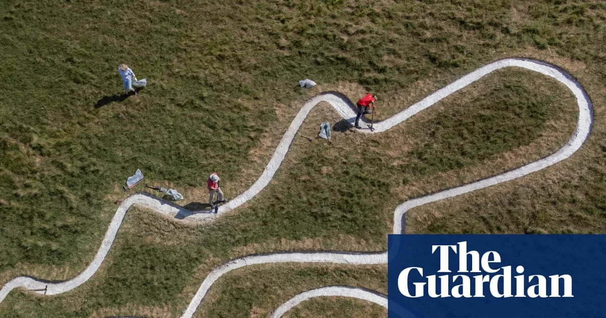 Cerne Giant's Rechalking Adapted as Climate Crisis Takes Toll