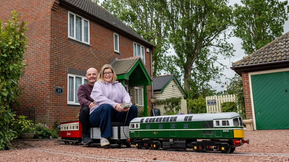 Train-mad couple say garden railway has made home unsellable or worth triple