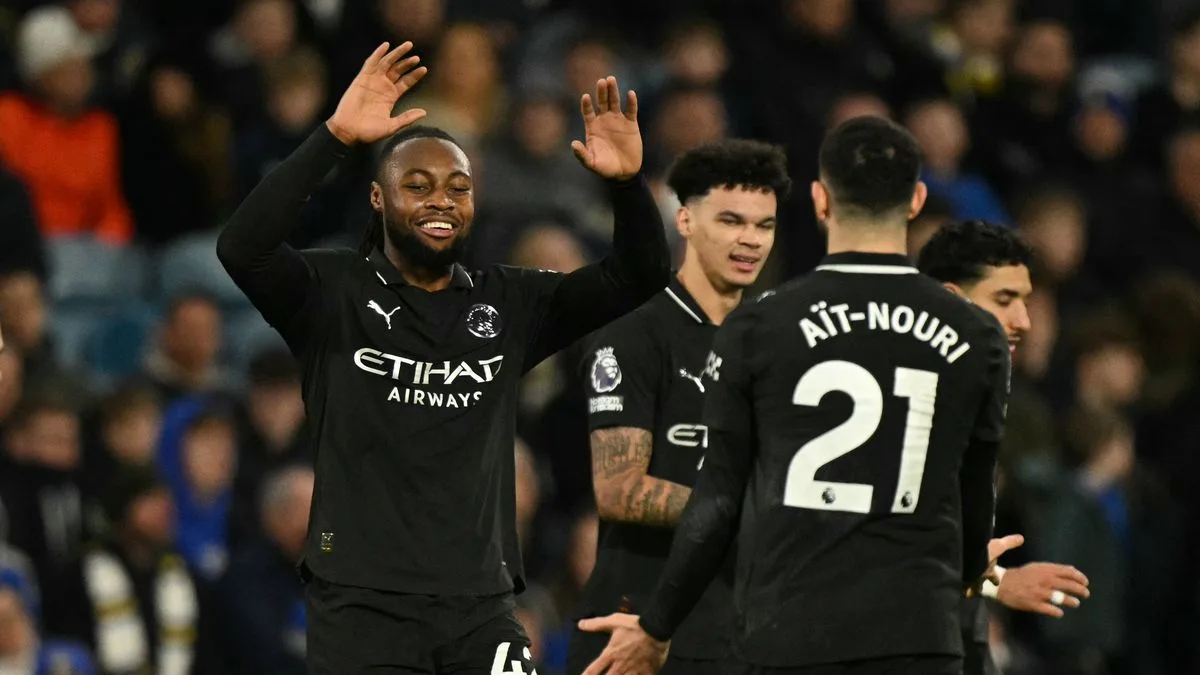 Man City cut Arsenal lead with narrow win at Leeds