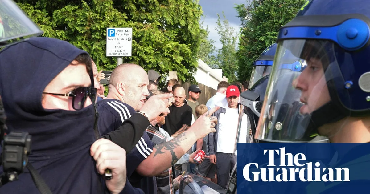 Riot police clash with far-right protesters outside Essex asylum hotel