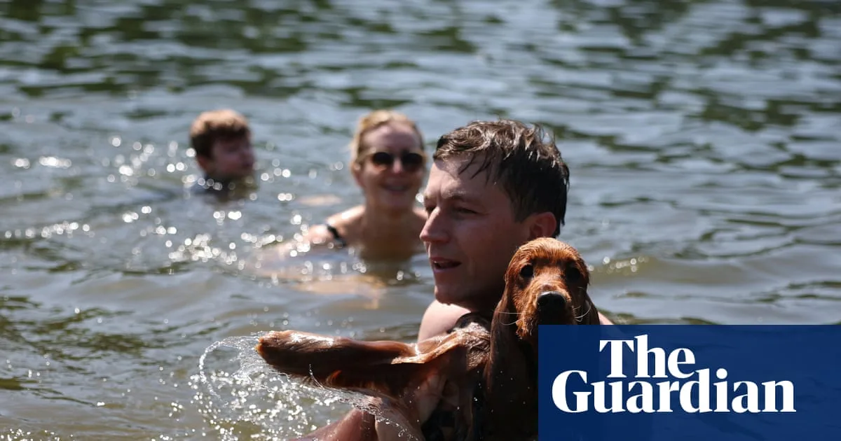 UK records hottest May day on record as temperatures hit 34.8C
