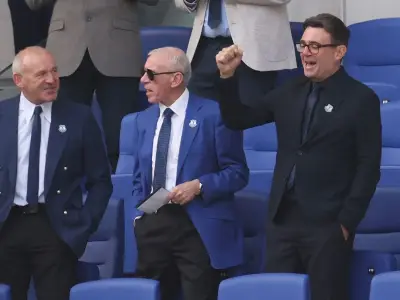 Andy Burnham sits in directors box at Everton due to security fears
