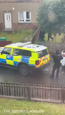 Armed Police Swarm Fife Street After Disturbance