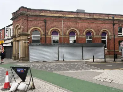 Bolton council orders removal of unauthorised bank extension and shutters