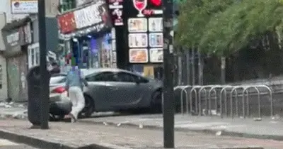 Bristol car mounts pavement: Three injured in Stokes Croft incident