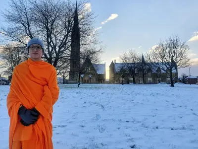 Buddhist monk punched in face by balaclava-clad boy in UK park