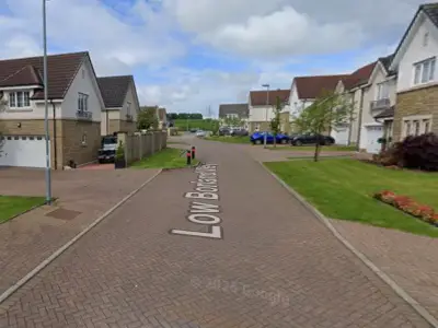 Car crashes into home near Glasgow amid gang war fears
