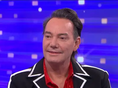 Craig Revel Horwood Recalls Stabbing and Strip-Search in Spain