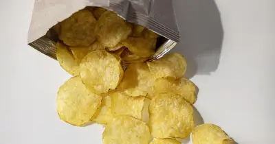 Experts Urge Brits to Check Crisp Packets Before Throwing Them Away