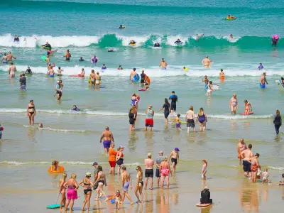 Father drowned trying to save daughter at Fistral Beach, inquest hears
