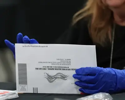 Federal judge blocks Trump mail-in voting order for midterms