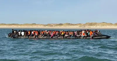 France warns no limit to migrants on boats to UK after record 230