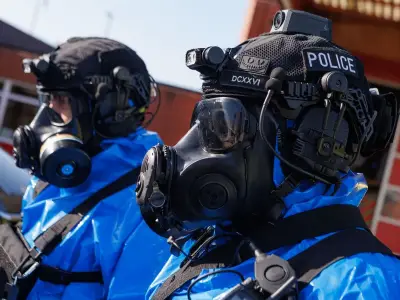 Haz-mat police swarm Stockport street after 'liquid drugs lab' arrests
