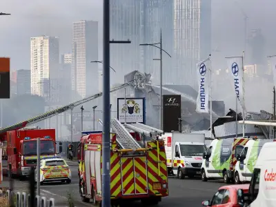 Huge fire tears through Marc Darcy shop in Salford