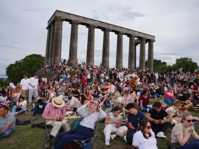 Hundreds gather on Calton Hill to watch rare solar eclipse in Edinburgh