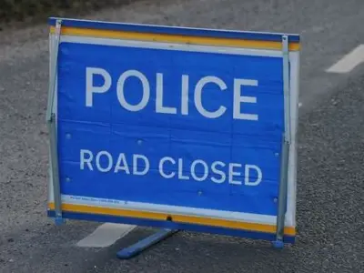 Hyde Road shut after car crashes into Gorton house