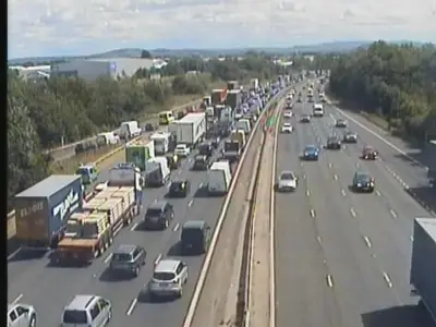 M6 crash causes hours of queues after central reservation damage