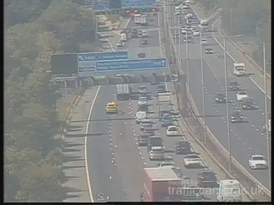M60 lanes closed after crash near Salford, queues building