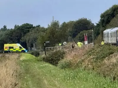 Man killed after train hits van at Lancashire level crossing