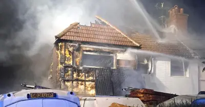 New Malden fire: Huge blaze rips through home as 70 firefighters scrambled