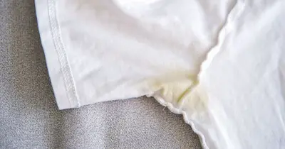 Remove suncream and sweat stains from white clothes with Oxy Bleach