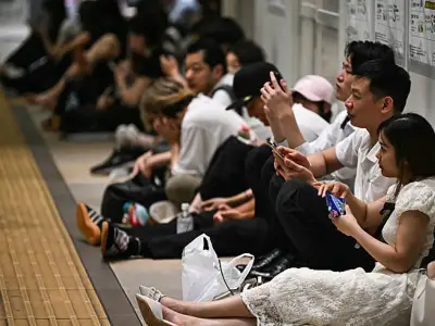 Thousands sleep in Japan airport as heavy rains block exit routes