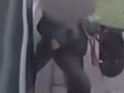 Toddler dragged by bus after legs trapped in doors