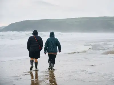 UK heatwave to end with 7C chill and rain in 13 areas