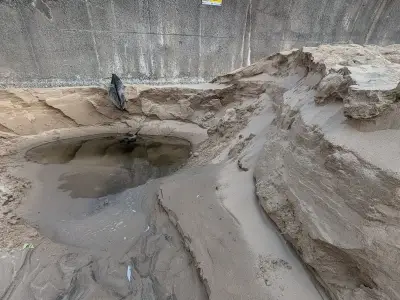 Warning Issued as Large Hole Opens on New Brighton Beach