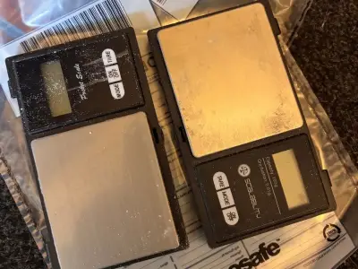 Woman, 27, arrested in Oldham after joint police raid finds drugs and cash