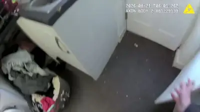 Wythenshawe suspect hides under laundry in police bodycam footage