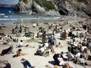 1940s Beach Photo Sparks Time Travel Claims Over 'Mobile Phone'