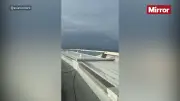 Airliners fly feet over Cape Town stadium in risky flyover